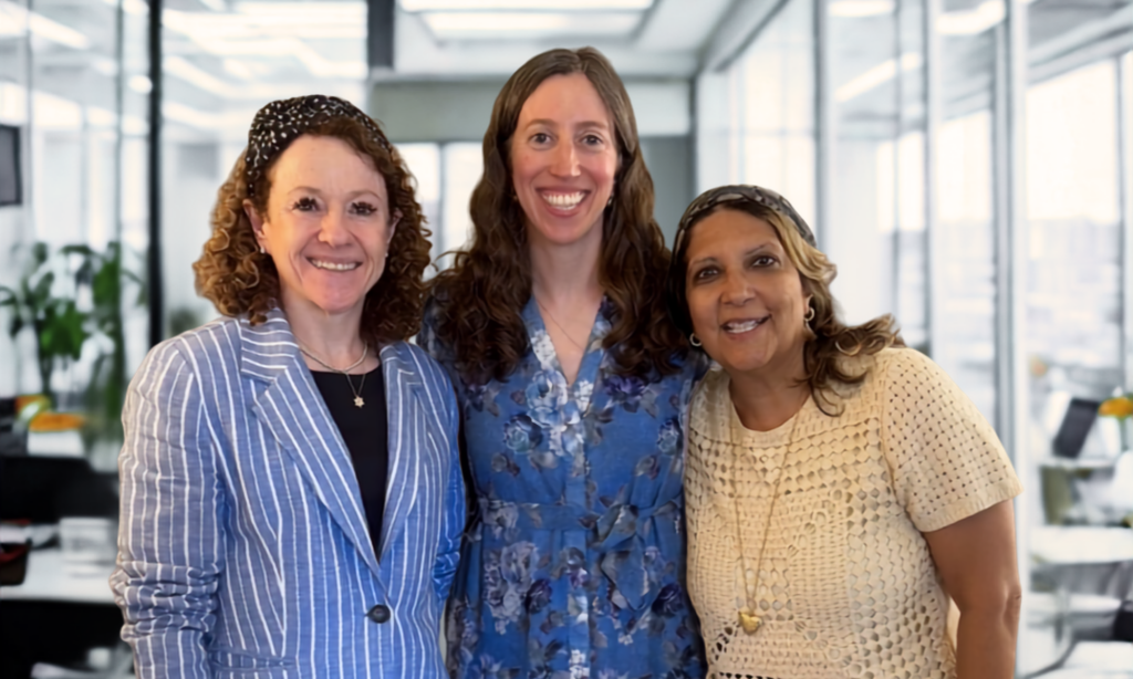Three Jofa Ambassadors smiling together in an office